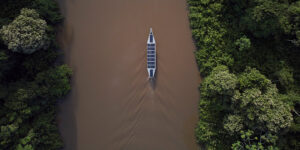 solar powered, torqeedo electric outboard canoes on the amazon river
