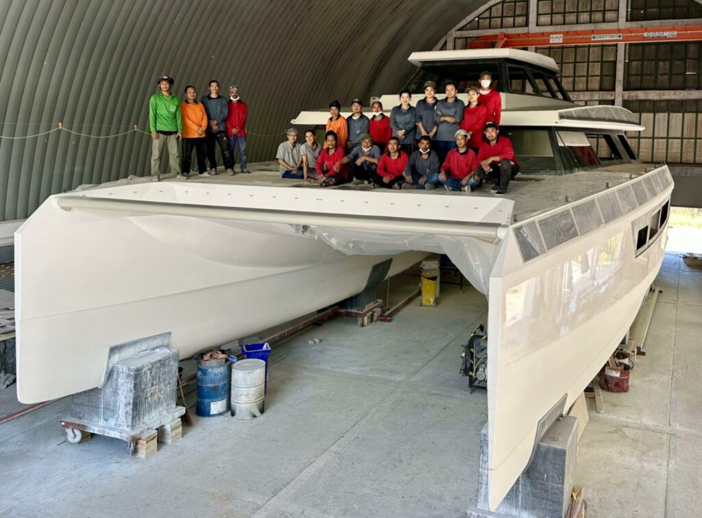  the GR63 Eco-Catamaran with an ePropulsion electric engine in production with the crew